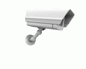 A White Security Camera Is Hanging On A White Wall . GIF