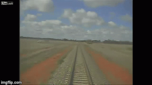 A White Suv Is Driving Down A Dirt Road With Imgflip.com In The Corner GIF