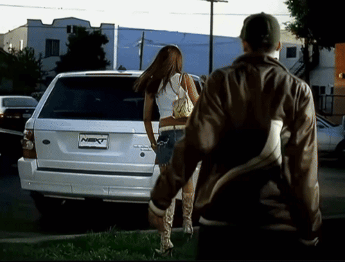 A White Suv With A Next License Plate GIF