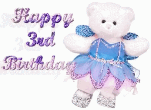 A White Teddy Bear Wearing A Blue And Purple Dress Is Standing Next To A Happy 3Rd Birthday Card . GIF