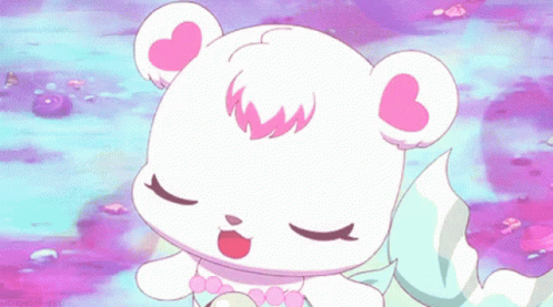 A White Teddy Bear With Pink Ears And A Pearl Necklace GIF