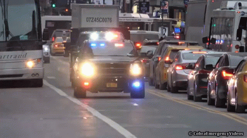 A White Truck With The Number 07Z45c0076 On The Back GIF