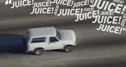 A White Van Is Driving Down A Highway With Juice Written On The Side GIF