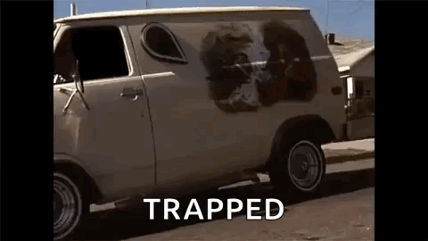 A White Van With A Picture Of A Lion Painted On The Side Is Parked On The Side Of A Road . GIF