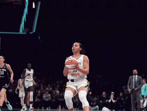 A Wilson Basketball Flies Through The Air GIF