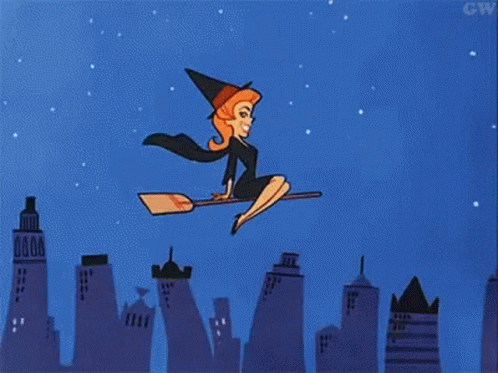 A Witch Is Flying On A Broom Over A City At Night . GIF