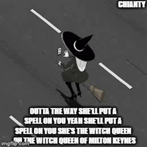 A Witch Is Sitting On A Broom In The Middle Of A Street . GIF
