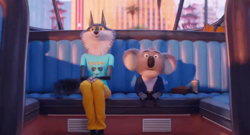 A Wolf And A Koala Are Sitting Next To Each Other In A Car GIF