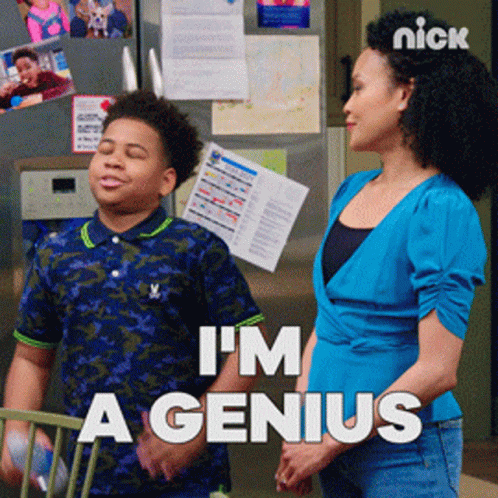 A Woman And A Boy Are Standing In Front Of A Refrigerator That Says I 'M A Genius On It GIF