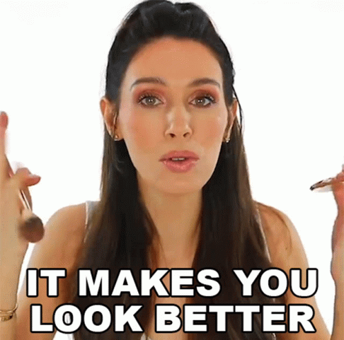 A Woman Applying Makeup With The Words It Makes You Look Better GIF