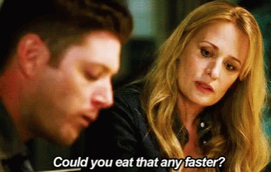 A Woman Asks A Man If He Could Eat Something Faster GIF