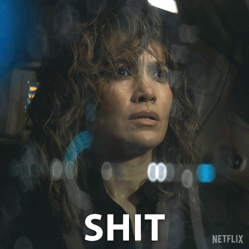 Woman Behind Glass With Shit Written Below GIF