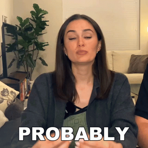 A Woman Blowing A Kiss With The Word Probably Written On The Bottom GIF