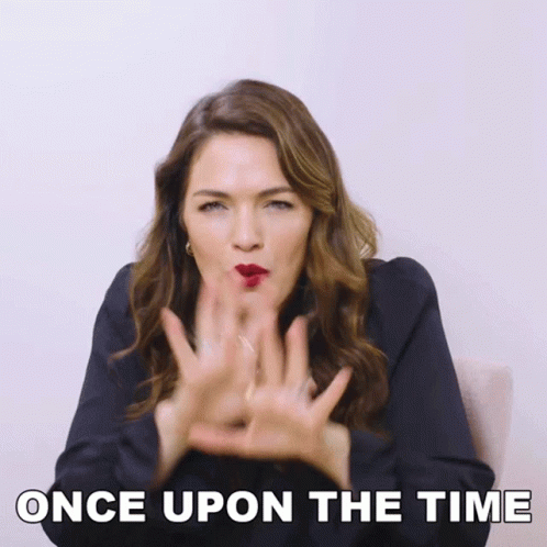 A Woman Blowing A Kiss With The Words " Once Upon The Time " Below Her GIF