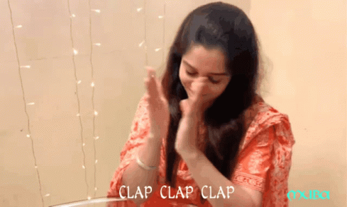 A Woman Clapping Her Hands With The Words Clap Clap Clap Written On The Bottom GIF