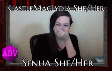 A Woman Covering Her Mouth With Her Hand With The Name Senua She / Her On The Bottom GIF