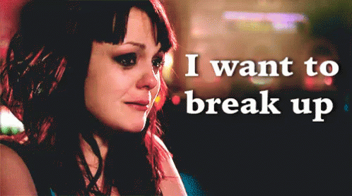 A Woman Crying With The Words " I Want To Break Up " Behind Her GIF