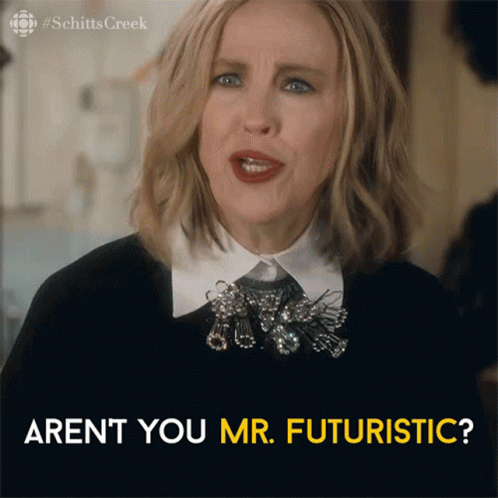 A Woman From Schitts Creek Says " Aren 'T You Mr. Futuristic ? " GIF