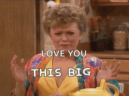 A Woman From The Golden Girls Is Sitting At A Table With A Teapot . GIF