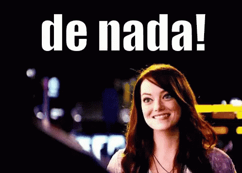 A Woman Giving A Thumbs Up With The Words De Nada Behind Her GIF