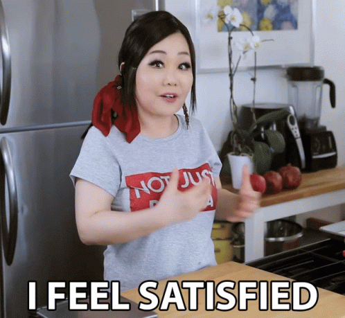 A Woman Giving A Thumbs Up With The Words I Feel Satisfied Underneath Her GIF