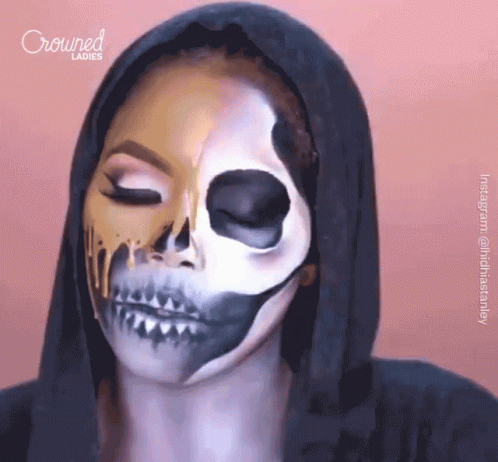 A Woman Has Her Face Painted To Look Like A Skeleton And Crowned Ladies Is Behind Her GIF