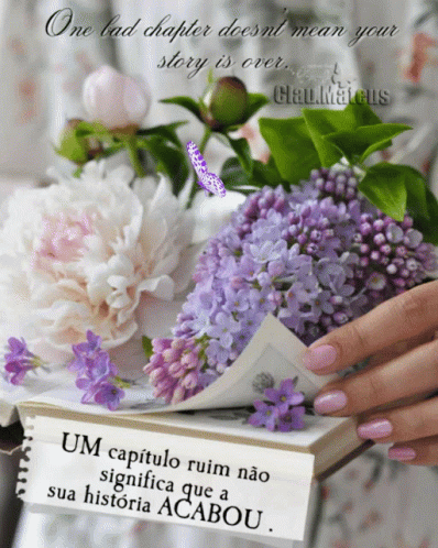 A Woman Holding A Book With Purple Flowers And A Quote That Says One Bad Chapter Does N't Mean Your Story GIF