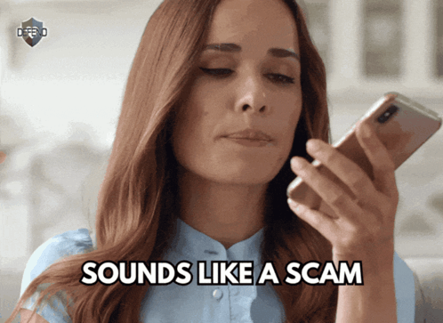 A Woman Holding A Cell Phone With The Words " Sounds Like A Scam " Below Her GIF