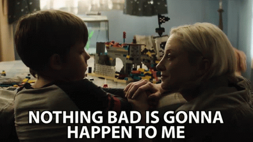 A Woman Holding A Child With The Words " Nothing Bad Is Gonna Happen To Me " On The Bottom GIF
