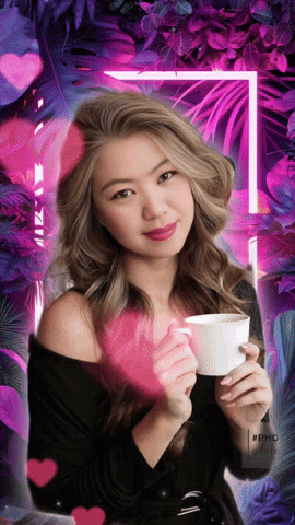 A Woman Holding A Cup Of Coffee In Front Of A Purple And Pink Background GIF