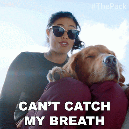 A Woman Holding A Dog With The Words Can 'T Catch My Breath GIF