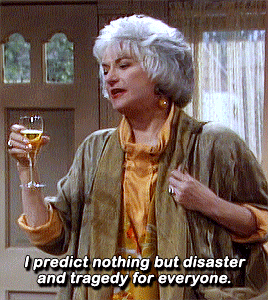 A Woman Holding A Glass Of Wine Says I Predict Nothing But Disaster And Tragedy For Everyone GIF