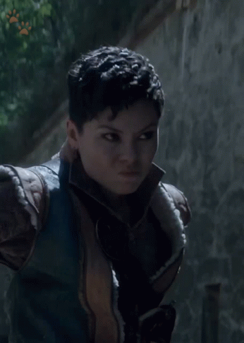 A Woman Holding A Knife With The Words It 'S Written On The Bottom GIF