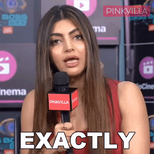 A Woman Holding A Microphone With The Words Exactly Written On It GIF