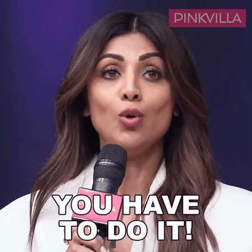 A Woman Holding A Microphone With The Words You Have To Do It GIF