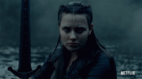 A Woman Holding A Sword With Netflix Written On The Bottom Right GIF