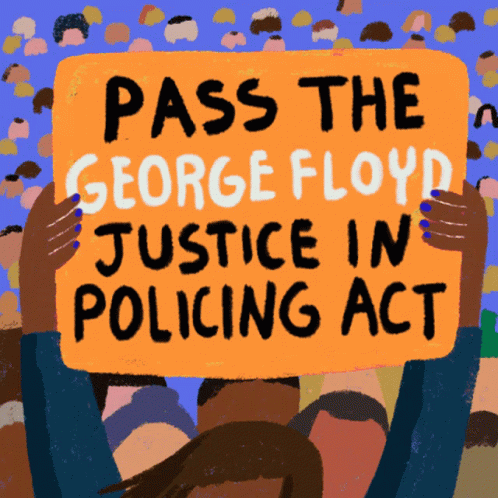 A Woman Holds Up A Sign That Says Pass The George Floyd Justice In Policing Act GIF