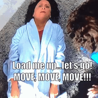 A Woman In A Bathrobe Is Laying On The Floor With The Words " Load Me Up Let 'S Go Move Move Move " GIF
