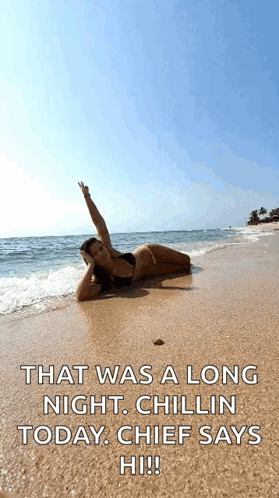 A Woman In A Bikini Is Laying On The Beach With The Words That Was A Long Night Chillin Today Chief Says Hi !! GIF