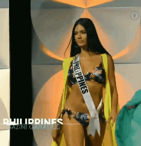 A Woman In A Bikini Wearing A Philippines Sash GIF