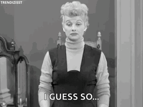 A Woman In A Black And White Photo Is Standing In Front Of A Mirror And Saying `` I Guess So ... '' . GIF
