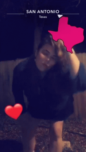 A Woman In A Black Dress Is Dancing In Front Of A Texas Map GIF