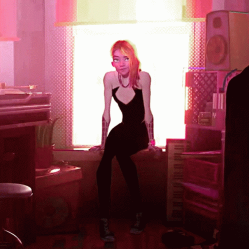 A Woman In A Black Dress Is Sitting On A Window Sill GIF