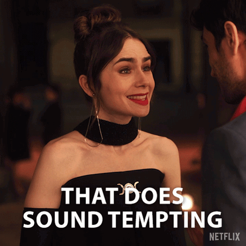 A Woman In A Black Dress Is Smiling Next To A Man And The Words That Does Sound Tempting GIF