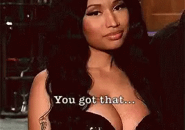 A Woman In A Black Dress Is Talking About Her Breasts And Saying `` You Got That ... '' GIF