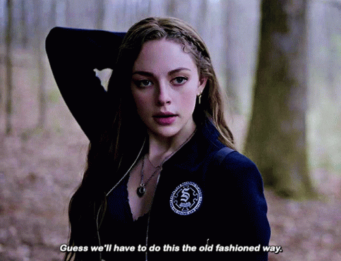 A Woman In A Black Jacket Says Guess We 'Ll Have To Do This The Old Fashioned Way .. GIF
