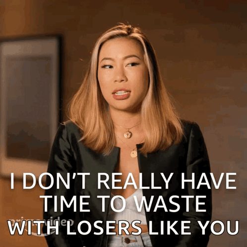 A Woman In A Black Jacket Says I Don T Really Have Time To Waste With Losers Like You GIF