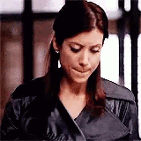 Woman In Black Leather Jacket Making Face GIF