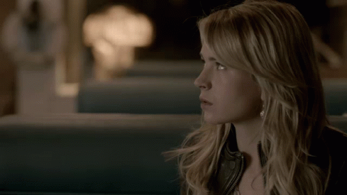 Woman In Black Leather Jacket Looking Side GIF
