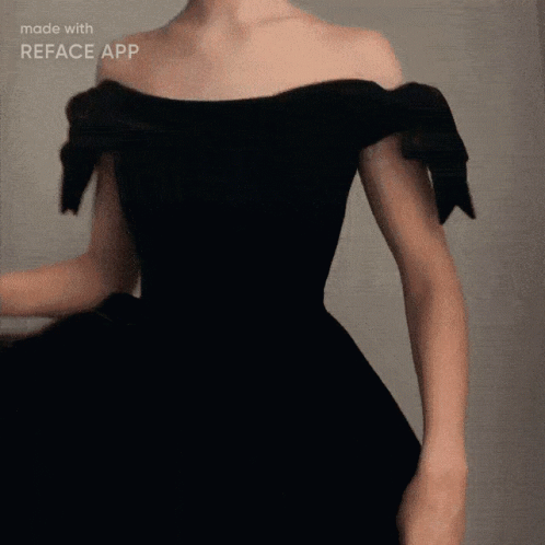 A Woman In A Black Off The Shoulder Dress Is Made With Reface App GIF